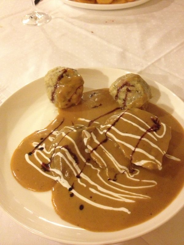 Bread dumpling thing with venison. We tried our best to finish it but the crazy waitress didn't help things much.