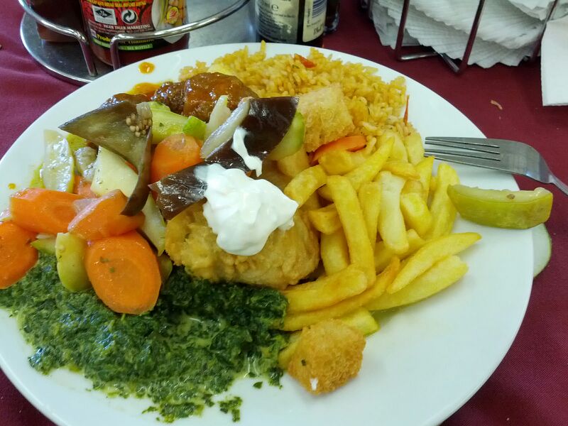 Damn here I am again. Luckily my food standards vary depending on where I am. So now that I'm in Ghana... Yay, fried fish!