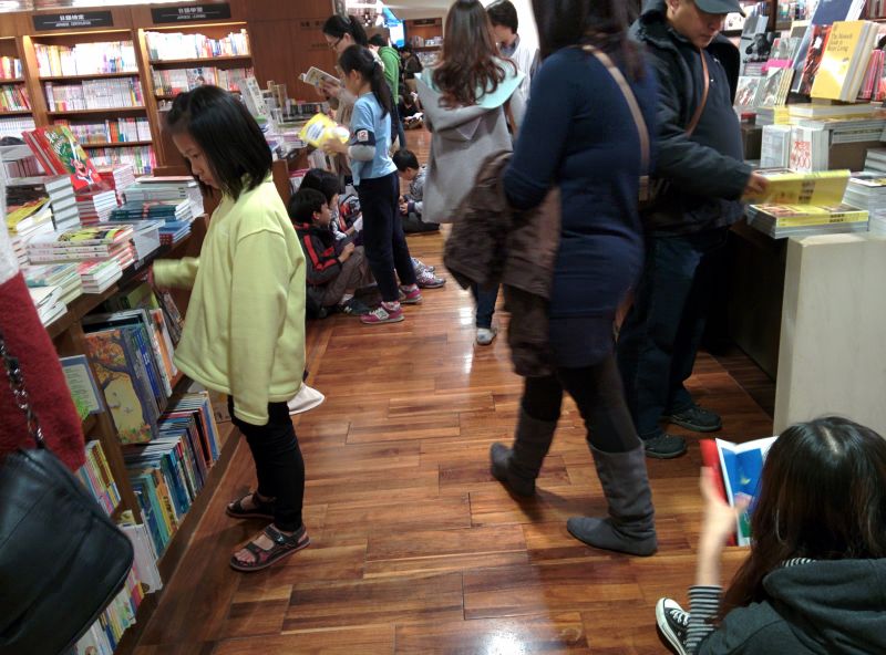 The floors were filled with people sitting on the floor reading books. Kind of weird. But we needed somewhere to sit so that's what we did too
